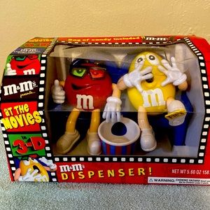 2 M&M candy dispensers 1 boxed 1 not perfect condition.